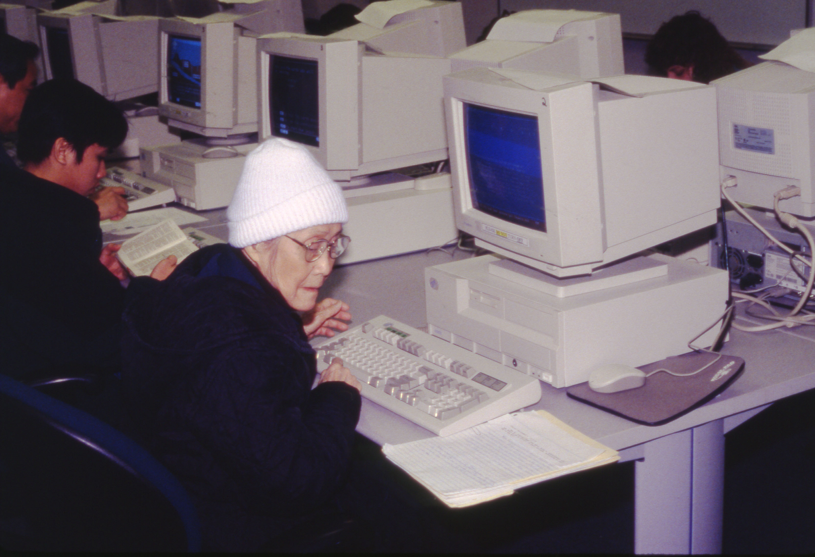 Elderly student using computer in the CAL Lab