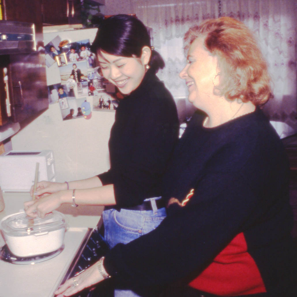 International student and homestay host in kitchen